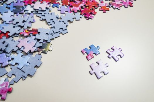 close up jigsaw puzzle pieces on background