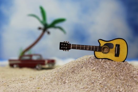 Acoustic Guitar on Tropical Beach With Palm Trees