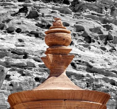 Close-up of the urn at the top of Al-Deir, the upper end of the Tholos from the monastery in Petra, Jordan