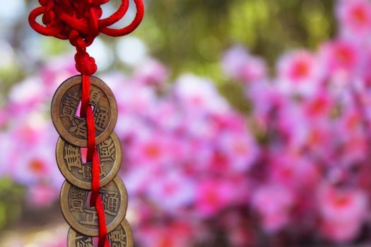 Chinese Feng Shu Wealth and Success Coins with Knot. Chinese New Year Decoration