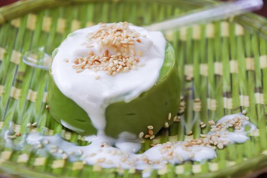 Pandanus Pudding in Sweet Coconut Cream, traditional Thai desserts decorated in modern style, with a Thai name called Ka-nom piak-poon.