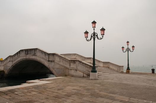 Istrian stone bridge in Venice early in the morning