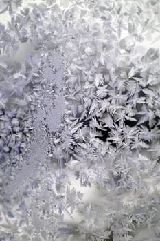 Abstract texture, pattern frost on the window, view macro. Shallow dof