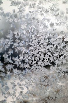 Abstract texture, pattern frost on the window, view macro. Shallow dof