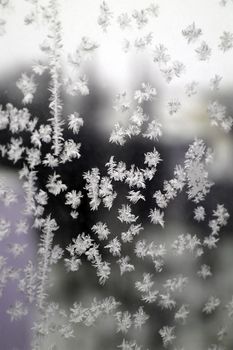 Abstract texture, pattern frost on the window, view macro. Shallow dof