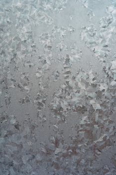 Abstract texture, pattern frost on the window, view macro. Shallow dof