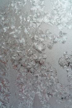 Abstract texture, pattern frost on the window, view macro. Shallow dof