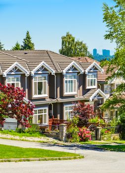 A row of townhouses on street in suburban of New Westminster, British Columbia