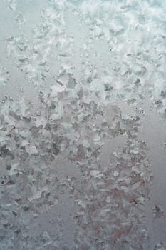 Abstract texture, pattern frost on the window, view macro. Shallow dof