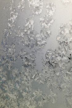 Abstract texture, pattern frost on the window, view macro. Shallow dof