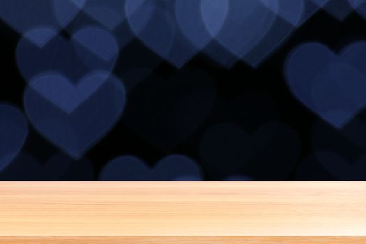 wood plank on lighting soft heart shaped bokeh for valentine background, empty wood table floors on heart shape bokeh night light multi color background, wood table board empty on bokeh heart shape