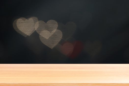 wood plank on lighting soft heart shaped bokeh for valentine background, empty wood table floors on heart shape bokeh night light multi color background, wood table board empty on bokeh heart shape