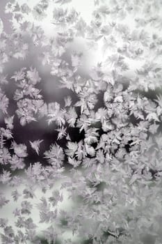 Abstract texture, pattern frost on the window, view macro. Shallow dof