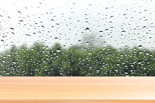 wood plank on raindrop window glass fresh background, empty wood table floors on raindrop splash background, wood table board empty on water rain fresh wall background