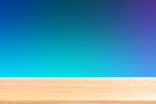 empty wood table floors on gradient blue soft background, wood table board empty front colorful gradient, wooden plank blank on dark blue gradient for display products or banner advertising