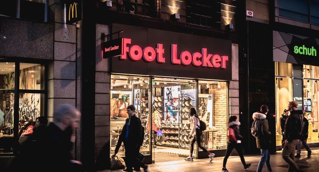 Dublin, Ireland - February 12, 2019: Night street atmosphere in the streets of the historic center where people walk on a winter day