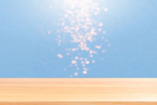 wood plank on blurred glitter effect bokeh on surface water background, wood table board empty on water bokeh in the river nature, wood table board empty on bokeh light at sea surface water ocean