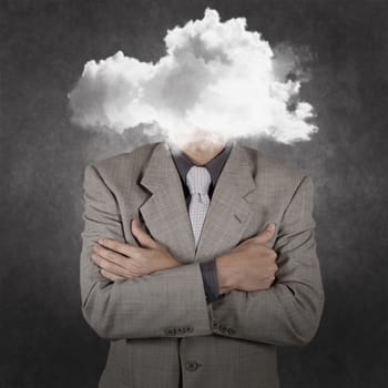 businessman with head in the clouds as concept