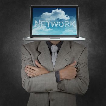 businessman with head as laptop computer and the clouds as cloud network concept