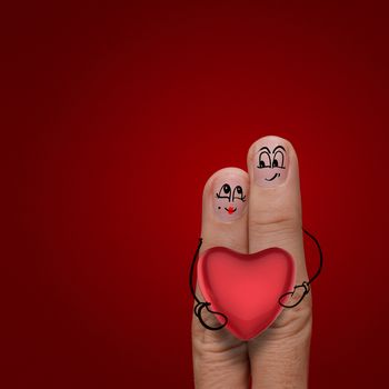 the happy finger couple in love with painted smiley and hold heart