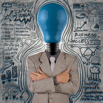 businessman with blue light bulb head as concept