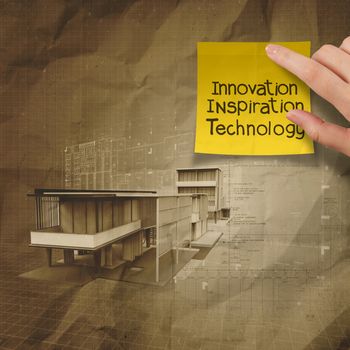 hand show innovation on sticky note with modern architectural on crumpled recycle paper background