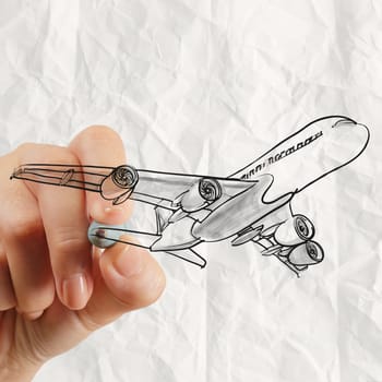 hand drawing airplane with crumpled paper background as concept