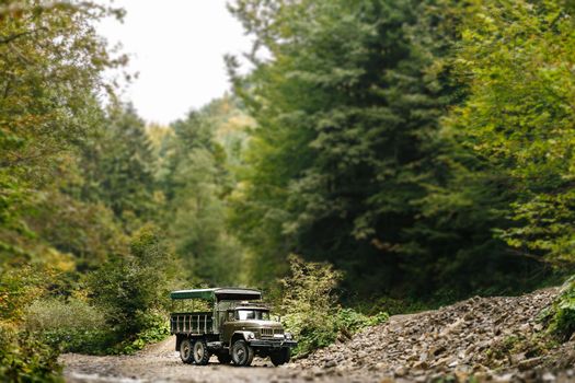 Soviet truck in the Carpathian Mountains carries people on excursions.