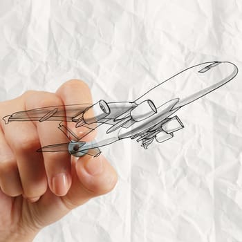 hand drawing airplane with crumpled paper background as concept