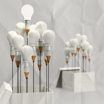 drawing idea pencil and light bulb concept outside the box as creative on crumpled paper