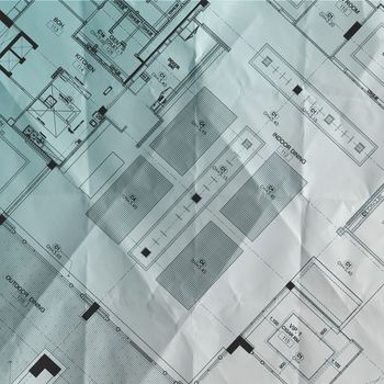 crumpled blue print part of architectural project