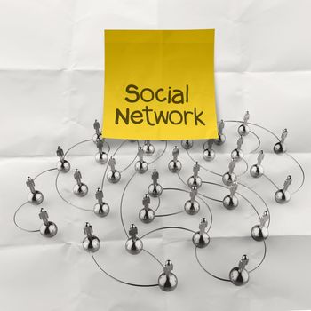 hand holding sticky note social network 3d stainless human social network on crumpled paper as concept