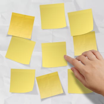 blank crumpled sticky note paper on texture paper as concept