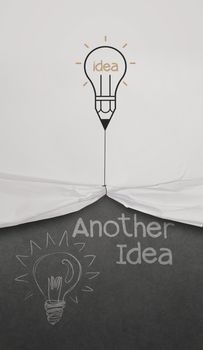 pencil lightbulb draw rope open wrinkled paper show another idea words as concept