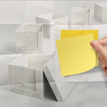 thinking outside the box on crumpled sticky note paper as concept