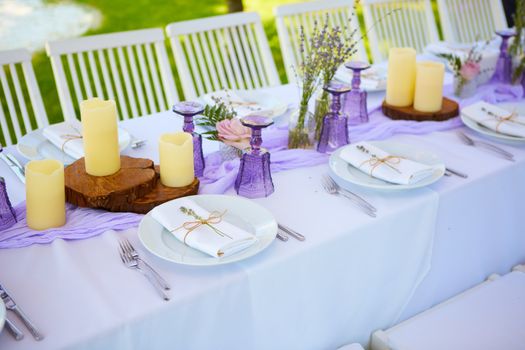 Table set for wedding or another catered event dinner. Shallow dof