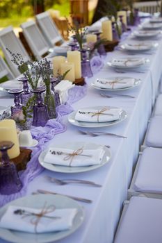 Table set for wedding or another catered event dinner. Shallow dof