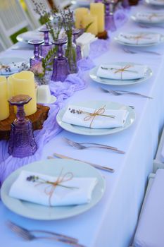 Table set for wedding or another catered event dinner. Shallow dof