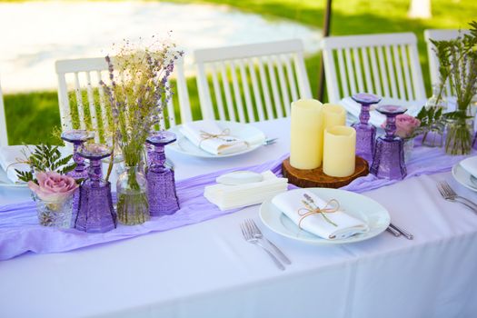 Table set for wedding or another catered event dinner. Shallow dof