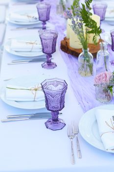 Table set for wedding or another catered event dinner. Shallow dof