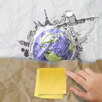 sticky note on recycle envelope with crumpled paper and traveling around the world as vintage style concept