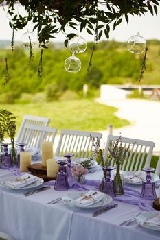 Table set for wedding or another catered event dinner. Shallow dof