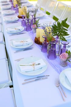 Table set for wedding or another catered event dinner. Shallow dof