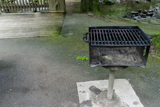 Horizontal shot of a well worn barbecue grill with copy space.