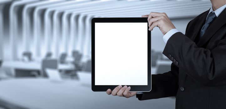 businessman success working with blank tablet computer his board room background