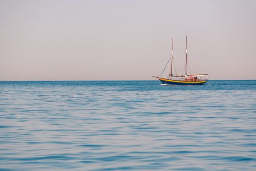 View on the seaside of Santorini island with ship on the sea