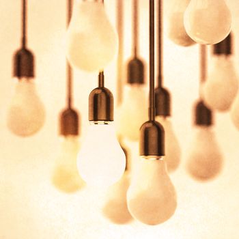 creative idea and leadership concept with growing 3d light bulb as vintage style concept