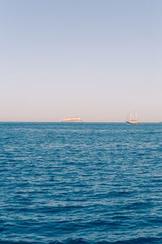 View on the seaside of Santorini island with ship on the sea