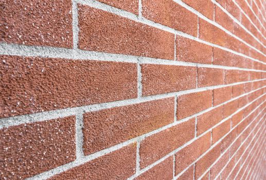 Close up of brick wall ending in infinity with shallow DOF.