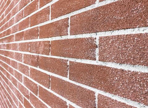 Close up of brick wall ending in infinity with shallow DOF.